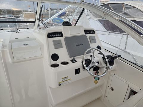 Helm station with wheel, instruments and Garmin display