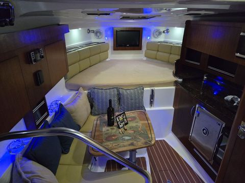 Cabin saloon with sofa and table